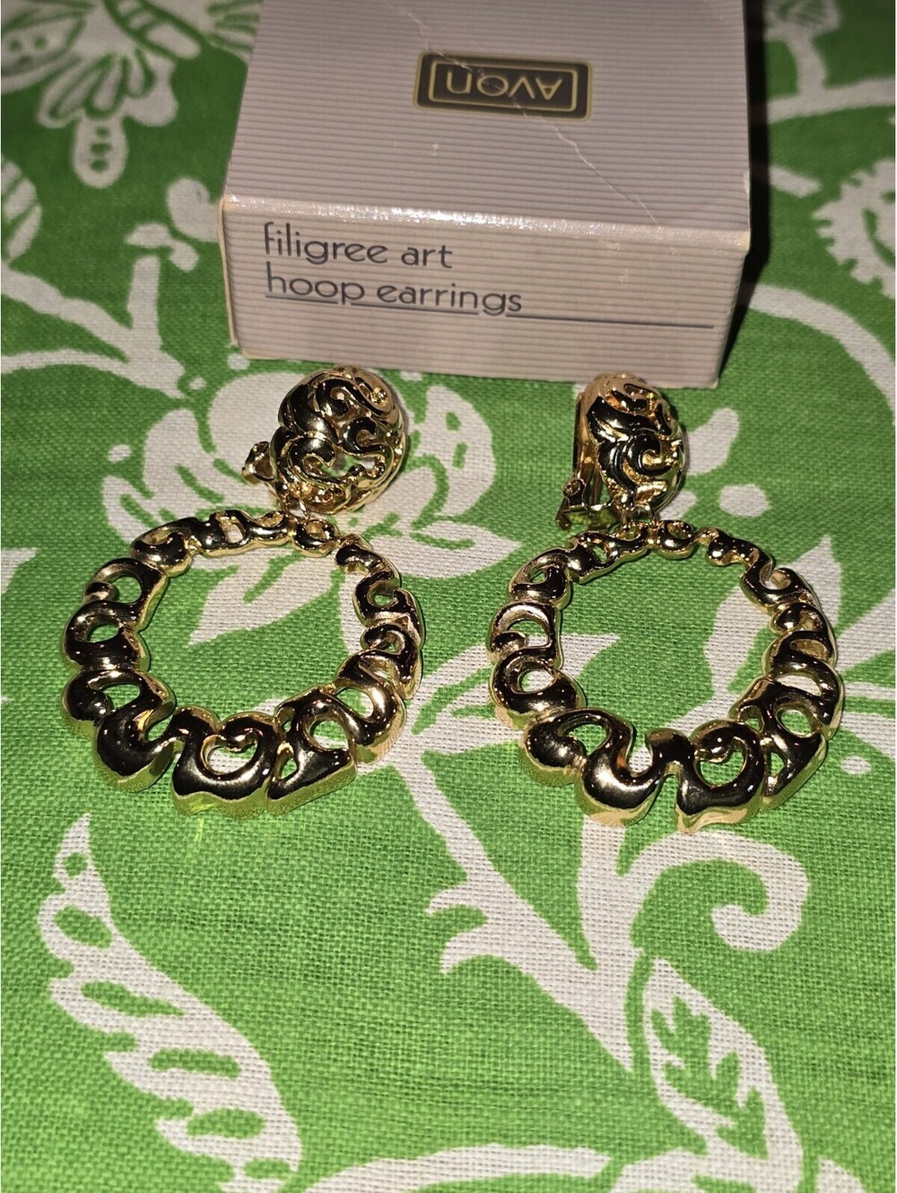 Avon Vintage jewelry-Gold Tone Filigree Art Hoop Clip-On Earrings Metal Lobe